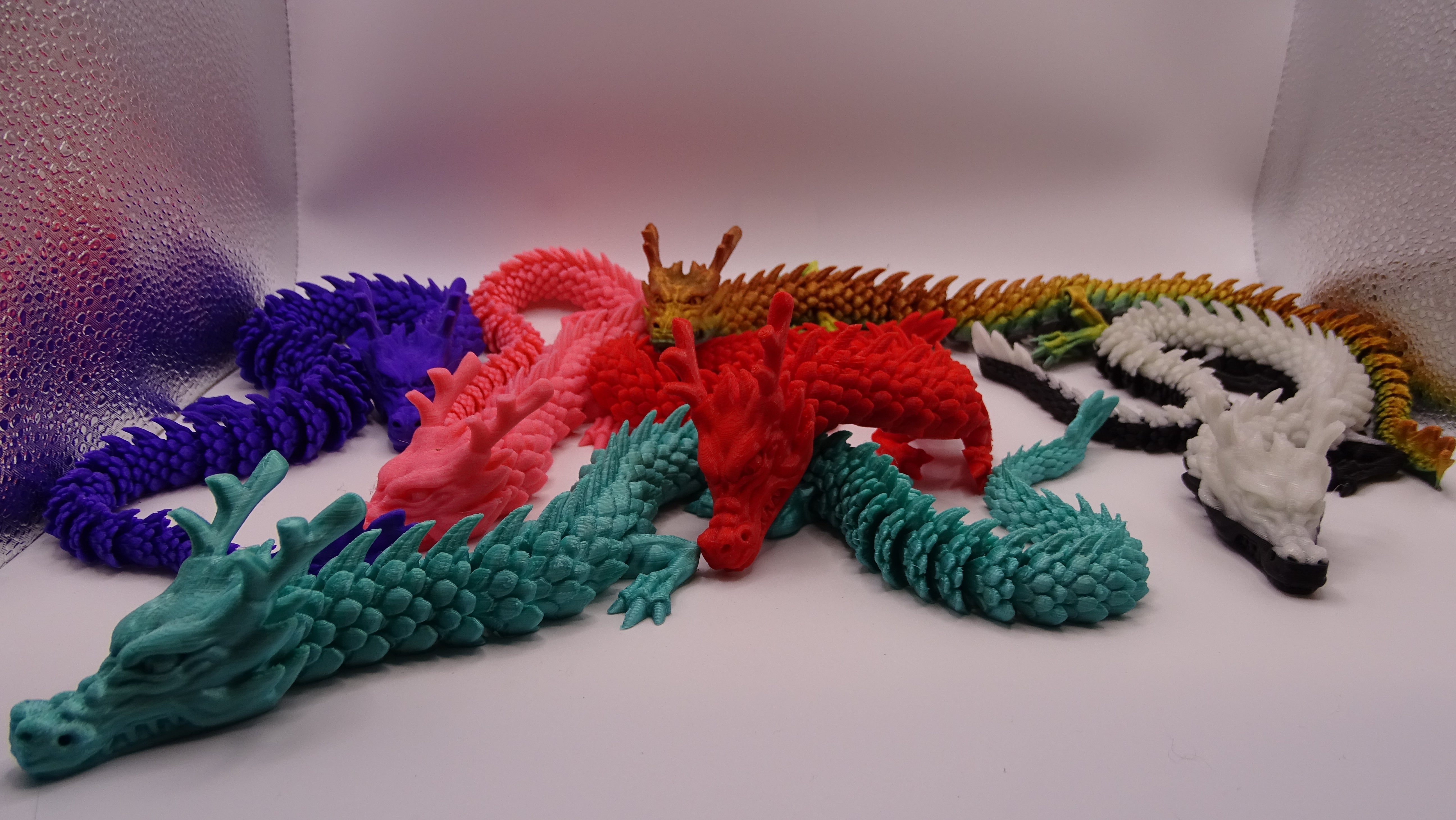 3d printed Articulated Dragon - PLA material Random selection. – Doops ...